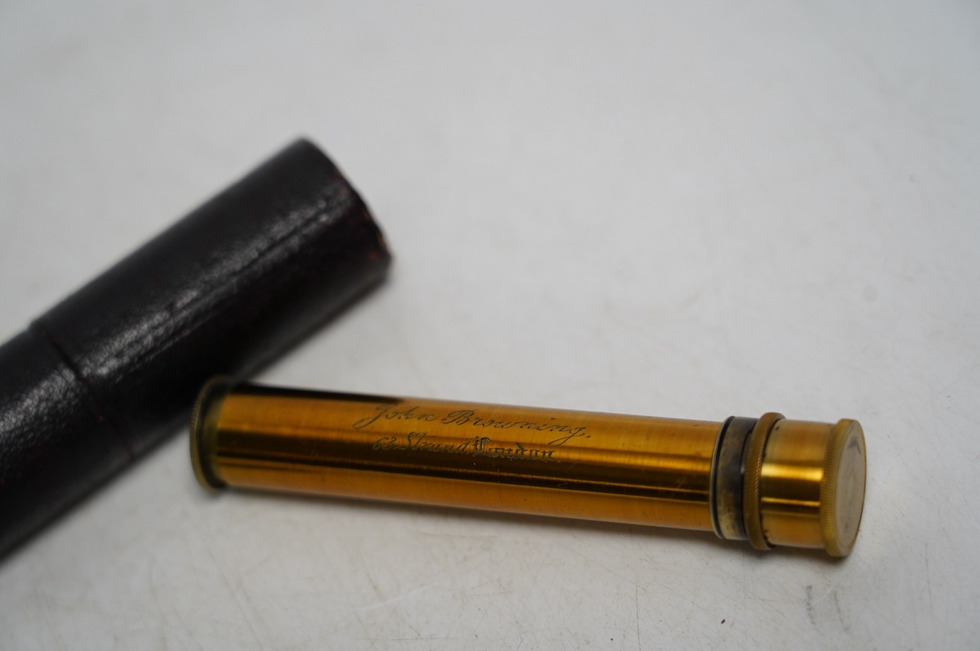 A late 19th century brass pocket spectroscope, engraved ‘John Browning London’. Condition - fair